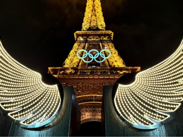 paris 2024 olympics   opening ceremony   paris france   july 26 2024 a general view showing wings and the olympic rings on the eiffel tower during the opening ceremony photo reuters